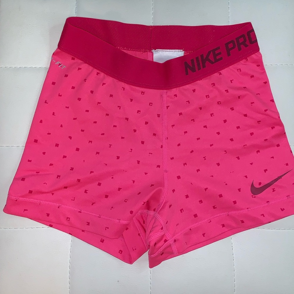 Pink Nike pros